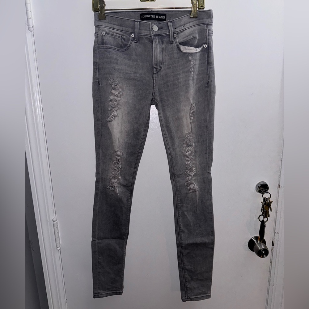 Mid rise ripped gray wash jeans
